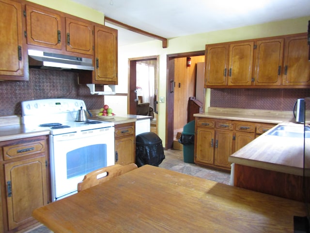 kitchen with backsplash, sink, white electric stove, and beamed ceiling