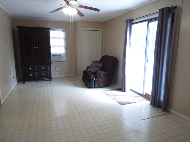 unfurnished room featuring baseboards, plenty of natural light, light floors, and ceiling fan