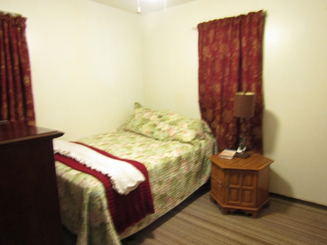 bedroom featuring carpet