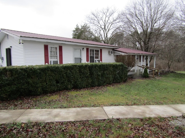 ranch-style house with a front lawn