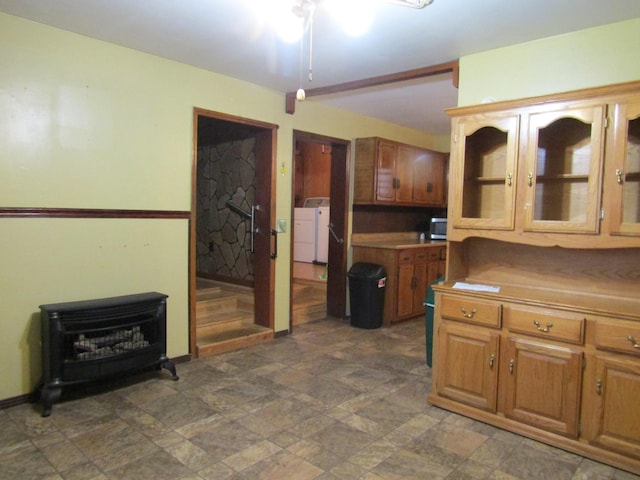 kitchen featuring washer and clothes dryer