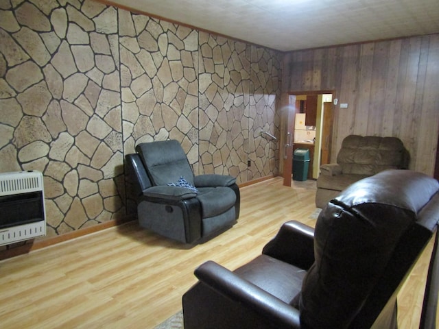 living room featuring hardwood / wood-style floors and heating unit