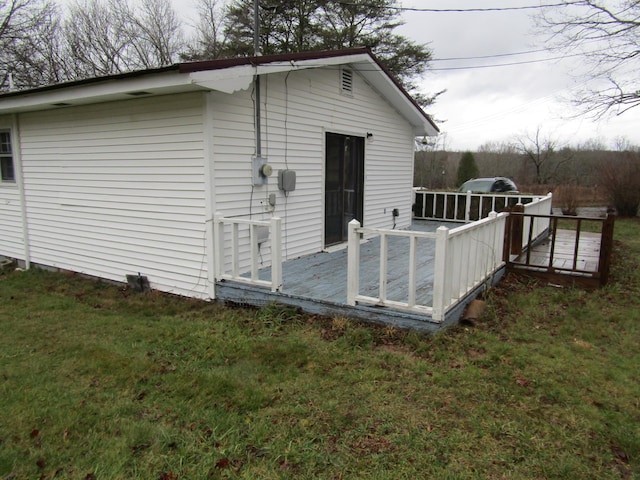 view of outdoor structure with a lawn