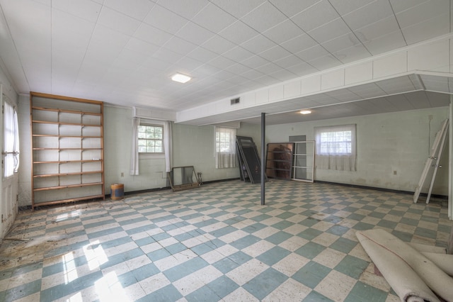 basement featuring tile patterned floors