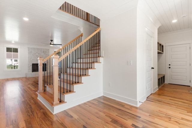 6816 Springwater St, Smyrna, TN 37167 - staircase with wood finished floors, a ceiling fan, baseboards, and recessed lighting
