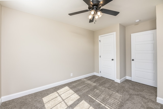 unfurnished bedroom with carpet, ceiling fan, and a closet