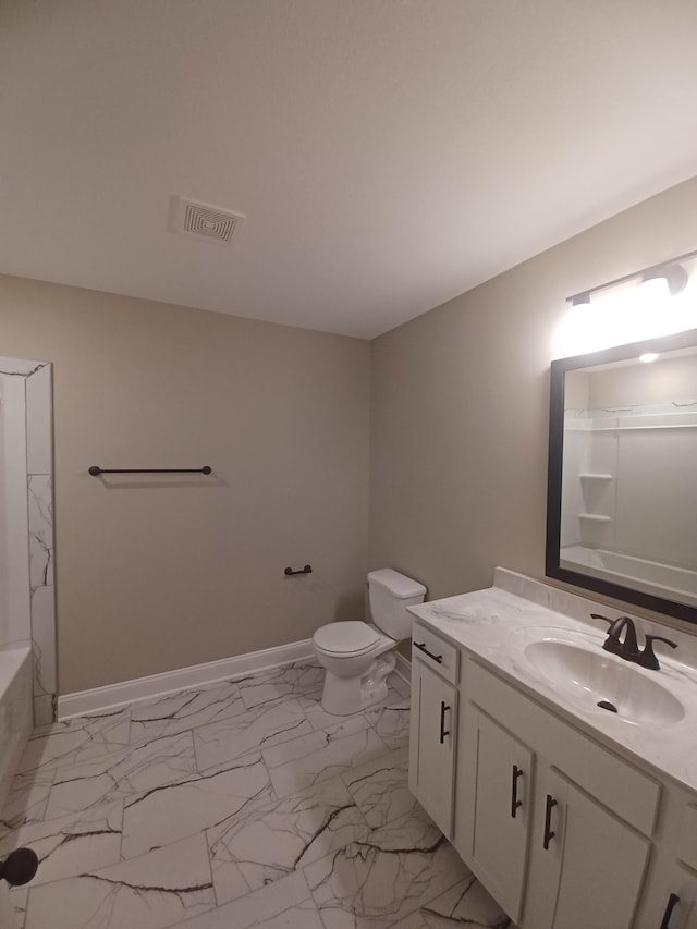 full bathroom featuring shower / bathing tub combination, vanity, and toilet