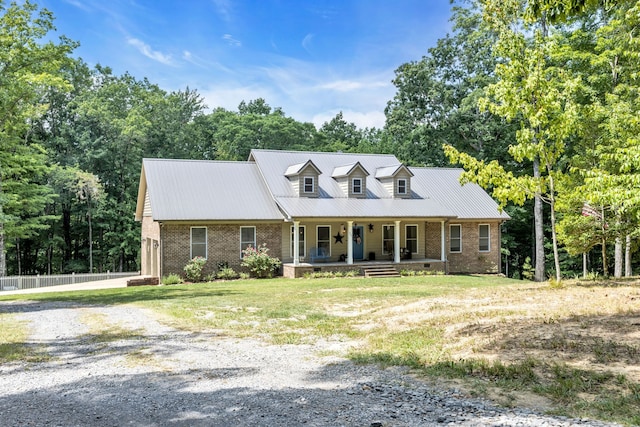 cape cod house with covered porch