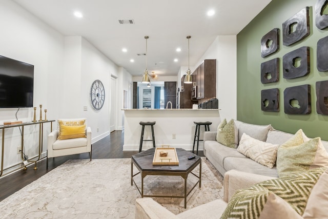 living room with dark wood-type flooring