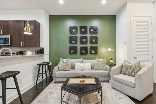 living room featuring dark hardwood / wood-style floors