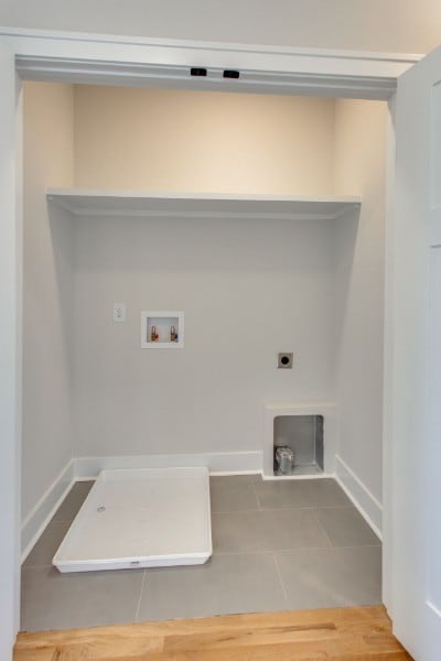 laundry room featuring tile patterned flooring, electric dryer hookup, and washer hookup