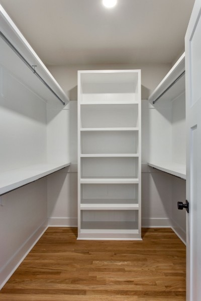 walk in closet featuring wood-type flooring