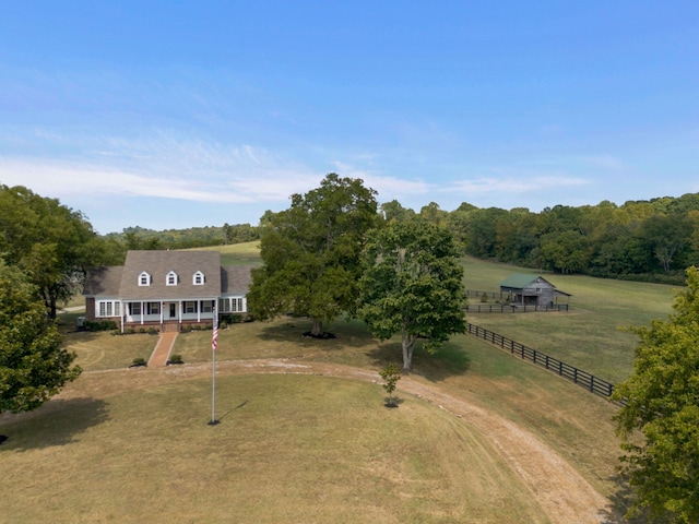 birds eye view of property featuring a rural view