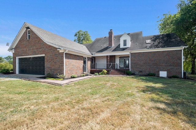 cape cod home with a garage and a front yard