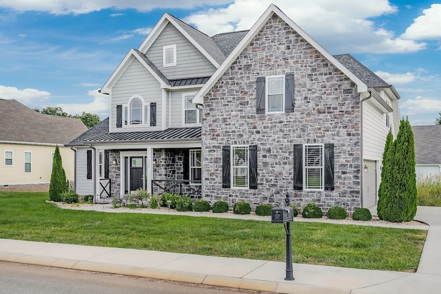 view of front facade with a front yard