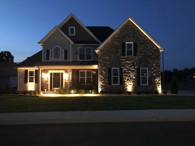 view of front of house with a front lawn