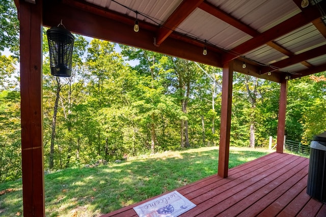 deck featuring a yard