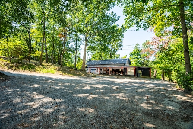 surrounding community featuring an outdoor structure