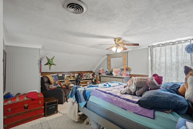 carpeted bedroom featuring a textured ceiling, vaulted ceiling, and ceiling fan