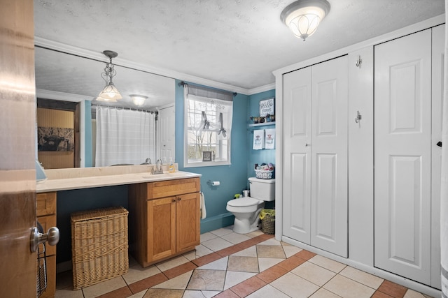 bathroom featuring vanity, crown molding, toilet, a shower with curtain, and tile patterned floors