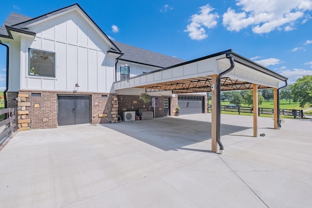 view of side of property featuring a garage