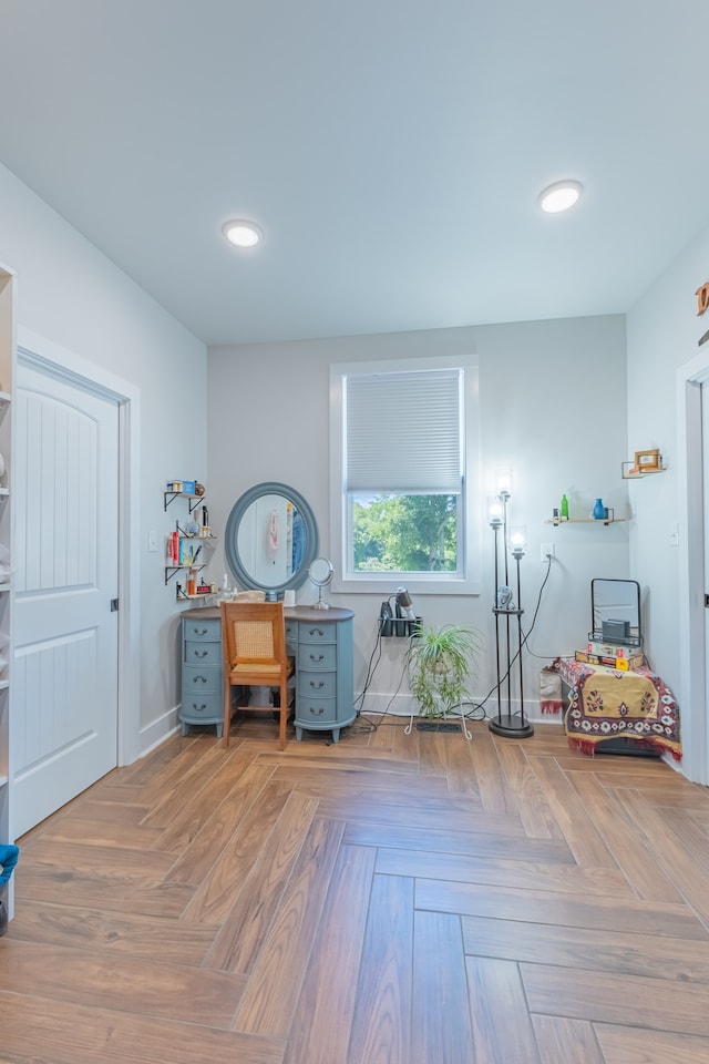 interior space featuring parquet flooring