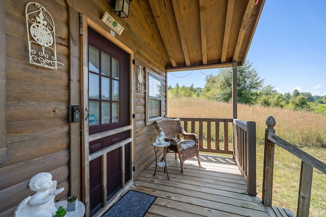 wooden terrace with covered porch