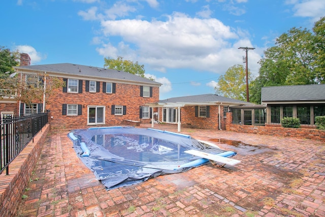 view of pool featuring a patio