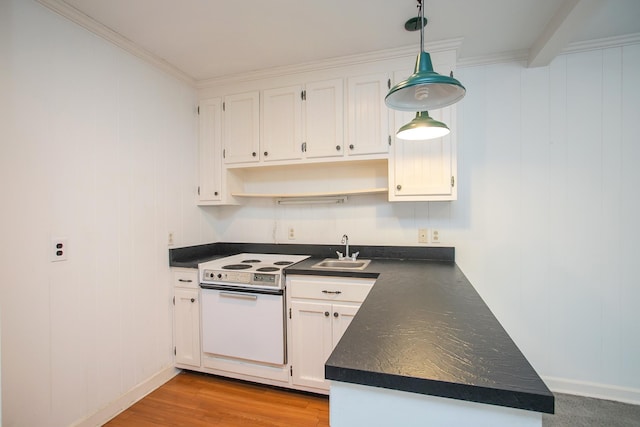 kitchen with ornamental molding, white cabinetry, sink, and electric stove