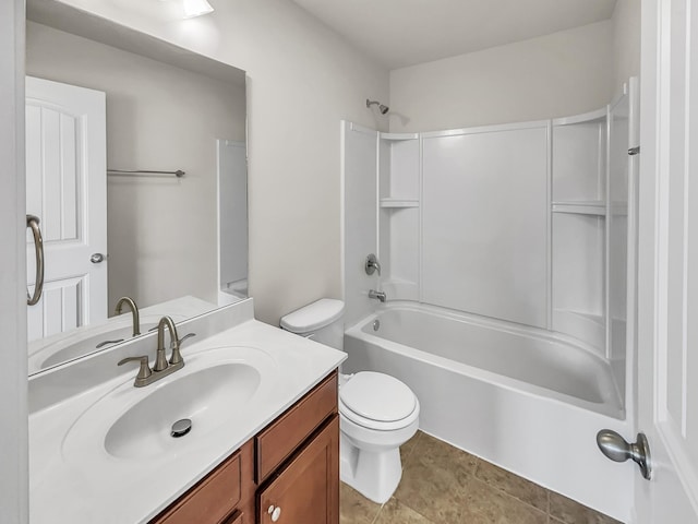 bathroom with shower / washtub combination, tile patterned flooring, vanity, and toilet