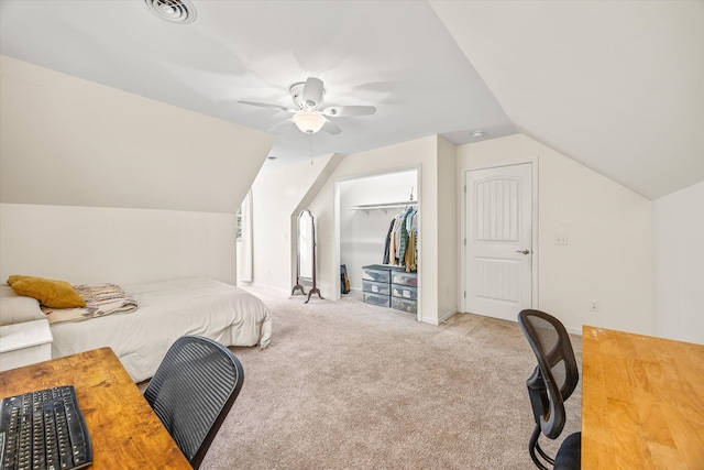 bedroom featuring a closet, ceiling fan, lofted ceiling, and light colored carpet