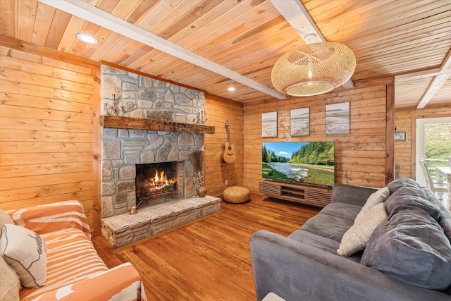 living room featuring wood ceiling, wooden walls, and hardwood / wood-style floors