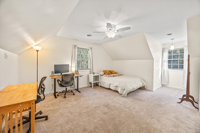 bedroom with vaulted ceiling, carpet flooring, and ceiling fan