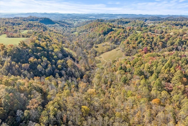 89 Ouchonder Rd, Elmwood, TN 38560 - aerial view of property and surrounding area featuring a forest and a mountain backdrop