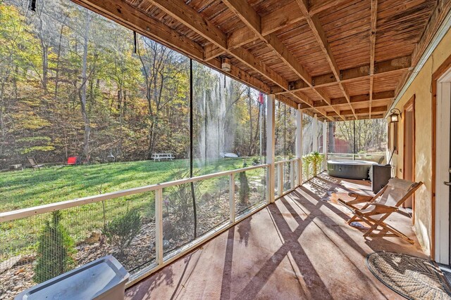 89 Ouchonder Rd, Elmwood, TN 38560 - unfurnished sunroom featuring a wooded view