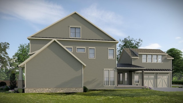 214 38th Ave N, Nashville, TN 37209 - rear view of house featuring a garage, metal roof, a yard, and a standing seam roof