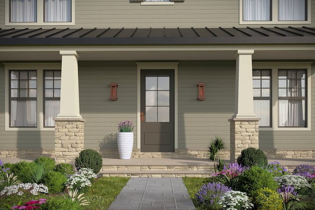 doorway to property with covered porch