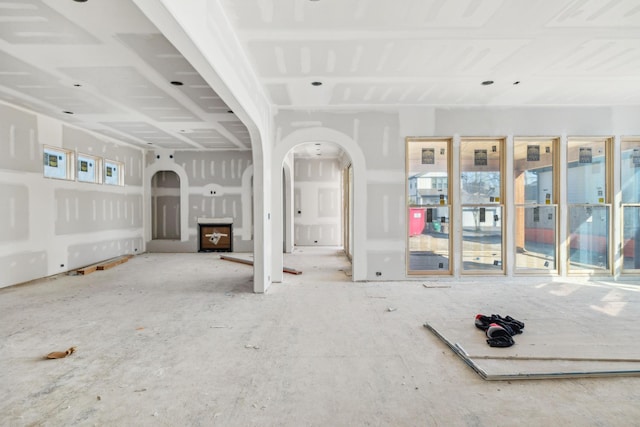 214 38th Ave N, Nashville, TN 37209 - unfurnished living room featuring arched walkways