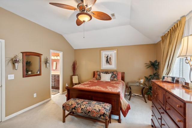 carpeted bedroom with lofted ceiling, ceiling fan, and ensuite bathroom