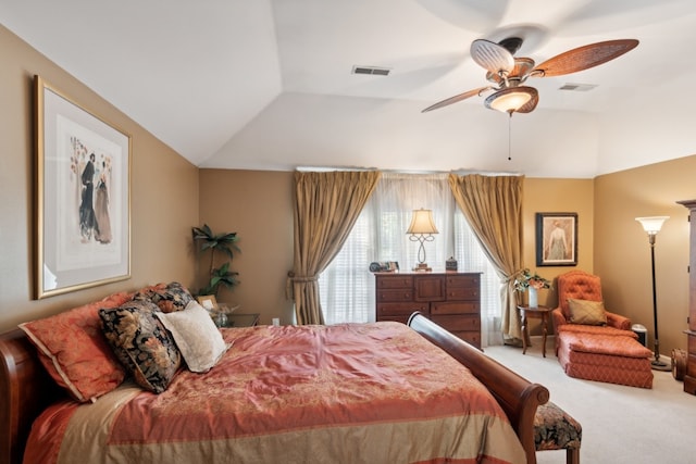 carpeted bedroom featuring vaulted ceiling and ceiling fan