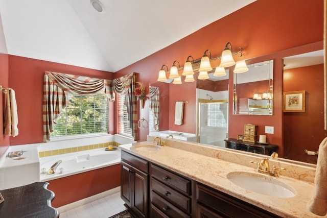 bathroom featuring tile patterned flooring, vanity, vaulted ceiling, and shower with separate bathtub