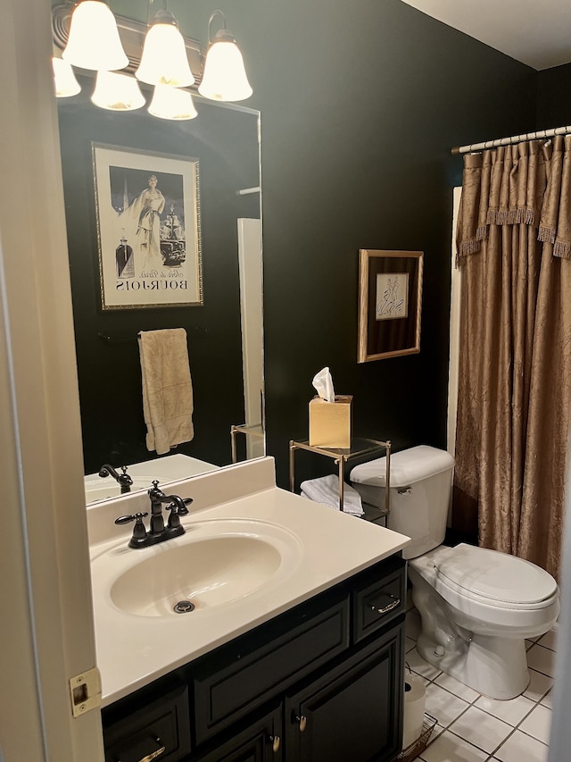 bathroom with a shower with curtain, tile patterned flooring, toilet, and vanity