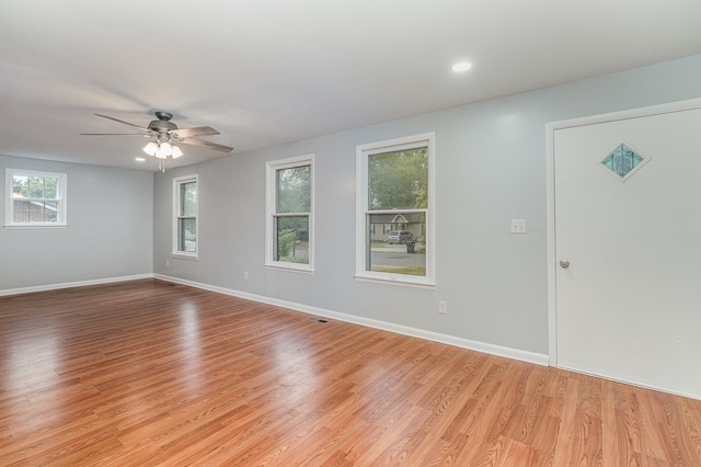 entrance foyer featuring ceiling fan and light hardwood / wood-style flooring