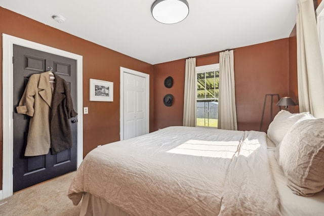 bedroom featuring carpet