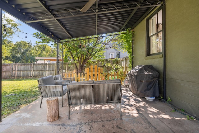 view of patio / terrace featuring an outdoor living space and grilling area