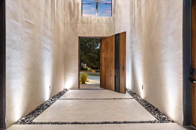 entryway featuring a towering ceiling