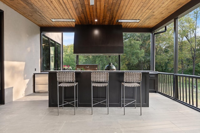 view of patio / terrace featuring outdoor wet bar