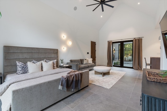 bedroom featuring high vaulted ceiling and access to outside