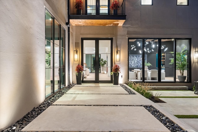 doorway to property featuring french doors and a balcony