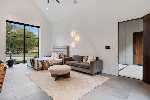 bedroom with high vaulted ceiling, access to exterior, tile patterned floors, and recessed lighting